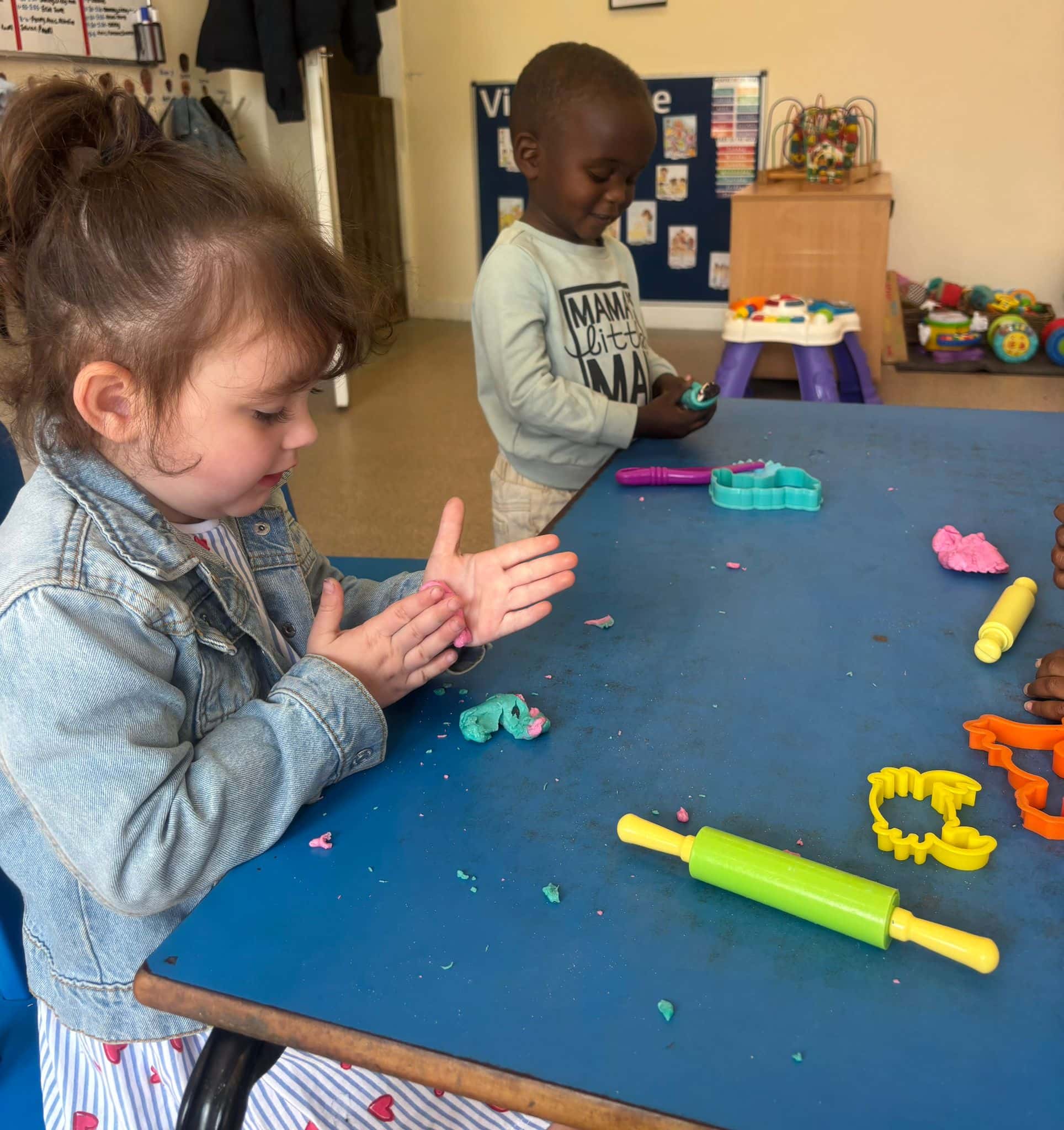 Children enjoying nursery play area